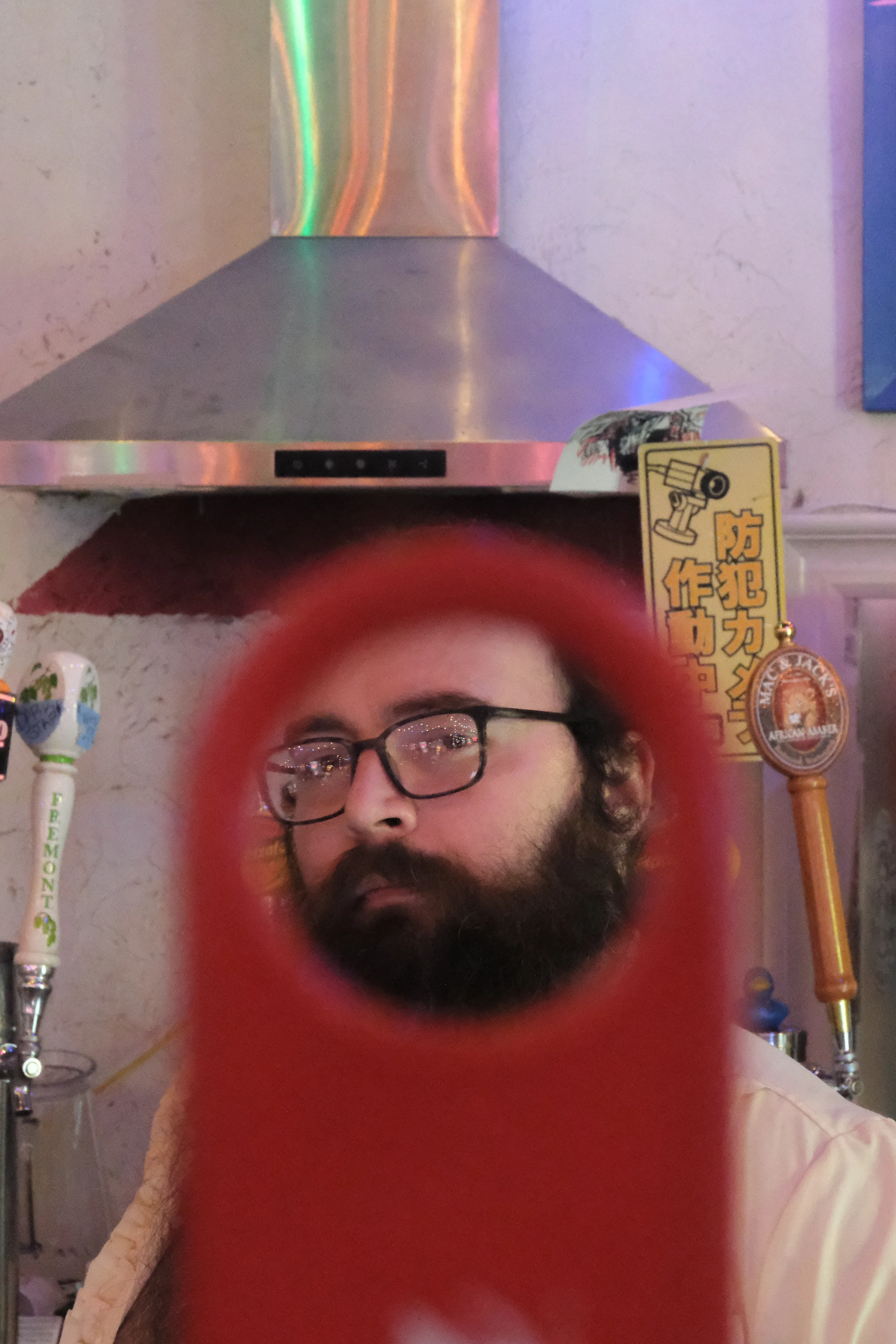 Man through bottle opener